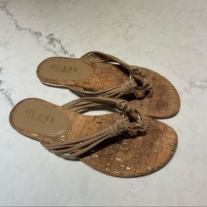 Guess gold flip flops